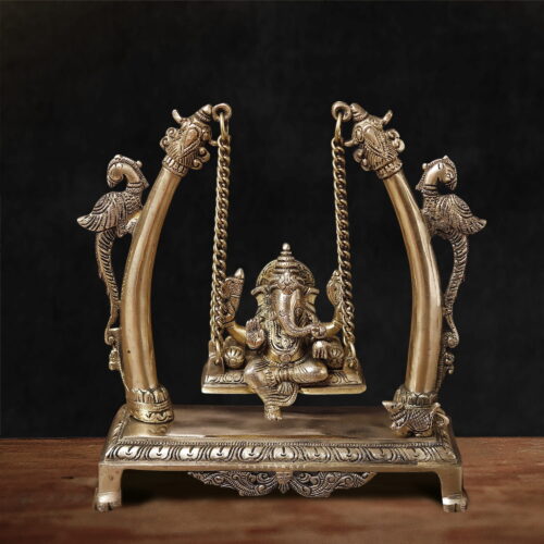 GANESHA IN GOLDEN PEACOCK JHULA