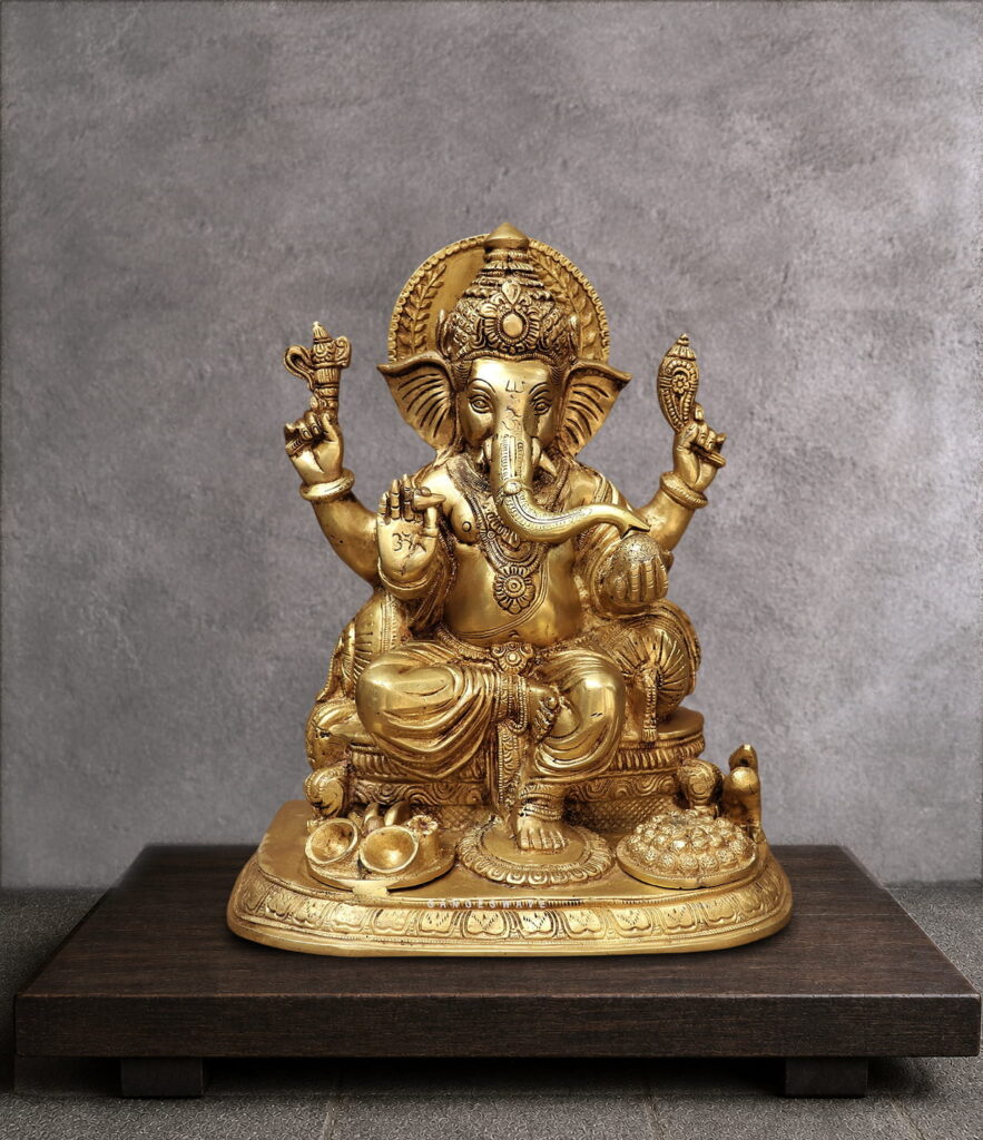 Brass golden ganesha with laddu thali - 13 inches