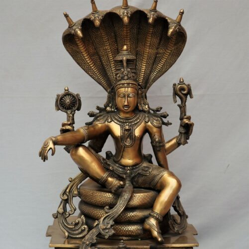 Brass Vishnu statue sitting on Sesh Naag