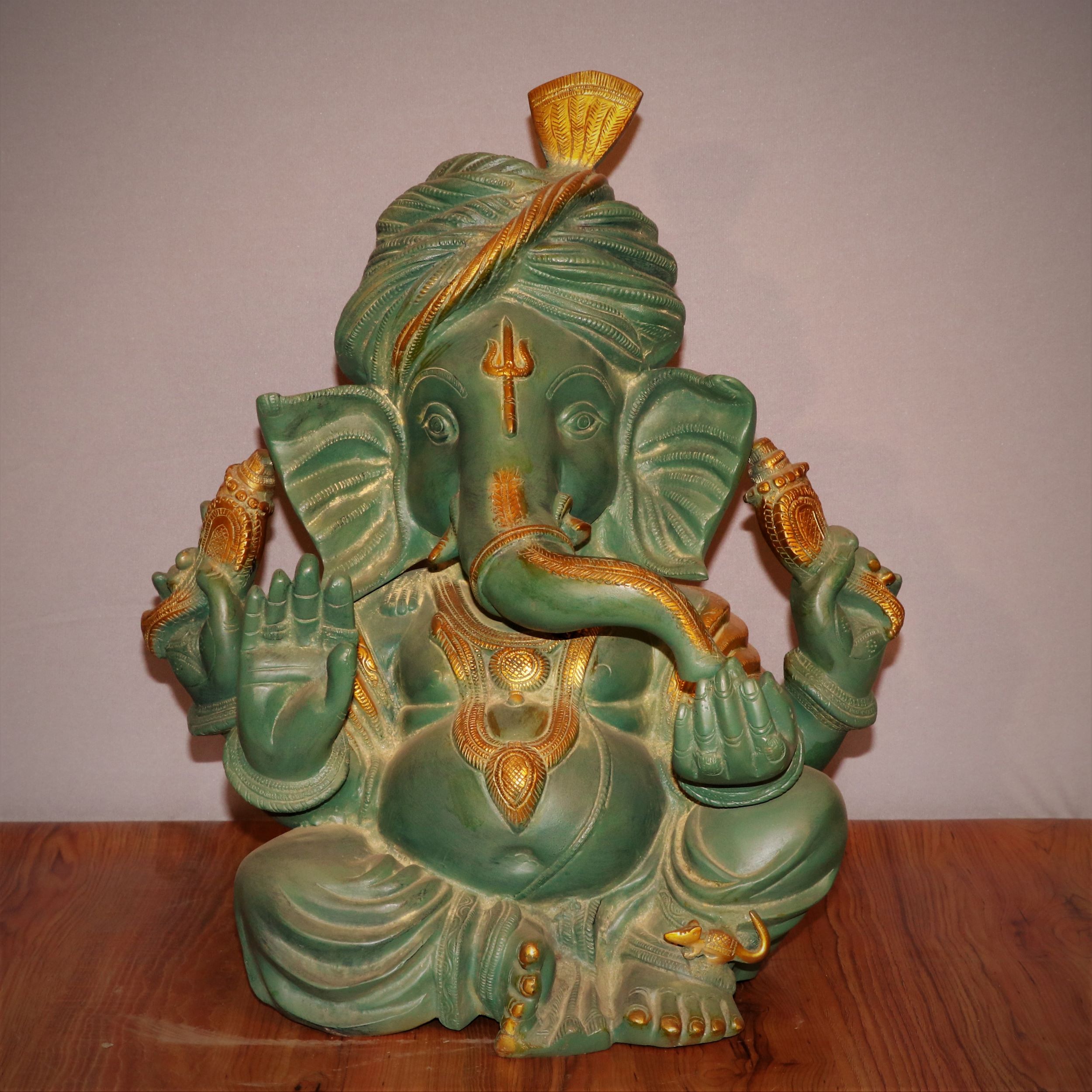 https://www.gangeswave.com/product/teal-green-ganesh-brass-statue