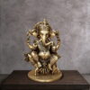 11" Ganesha Statue sitting on musak