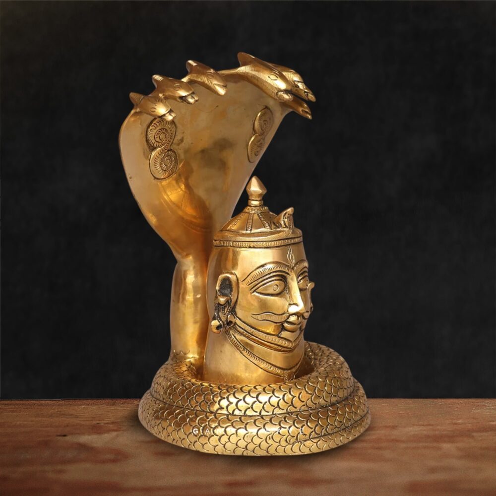 Traditional Hindu brass Shiva head sculpture with serpent hood