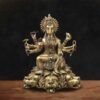 Religious brass idol Varaha Vishnu sitting on lotus base with lions