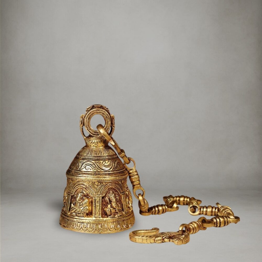 Handcrafted brass temple bell with intricate Ganesha carvings and ornate brass chain