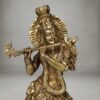 Premium brass Krishna figurine on decorative pedestal