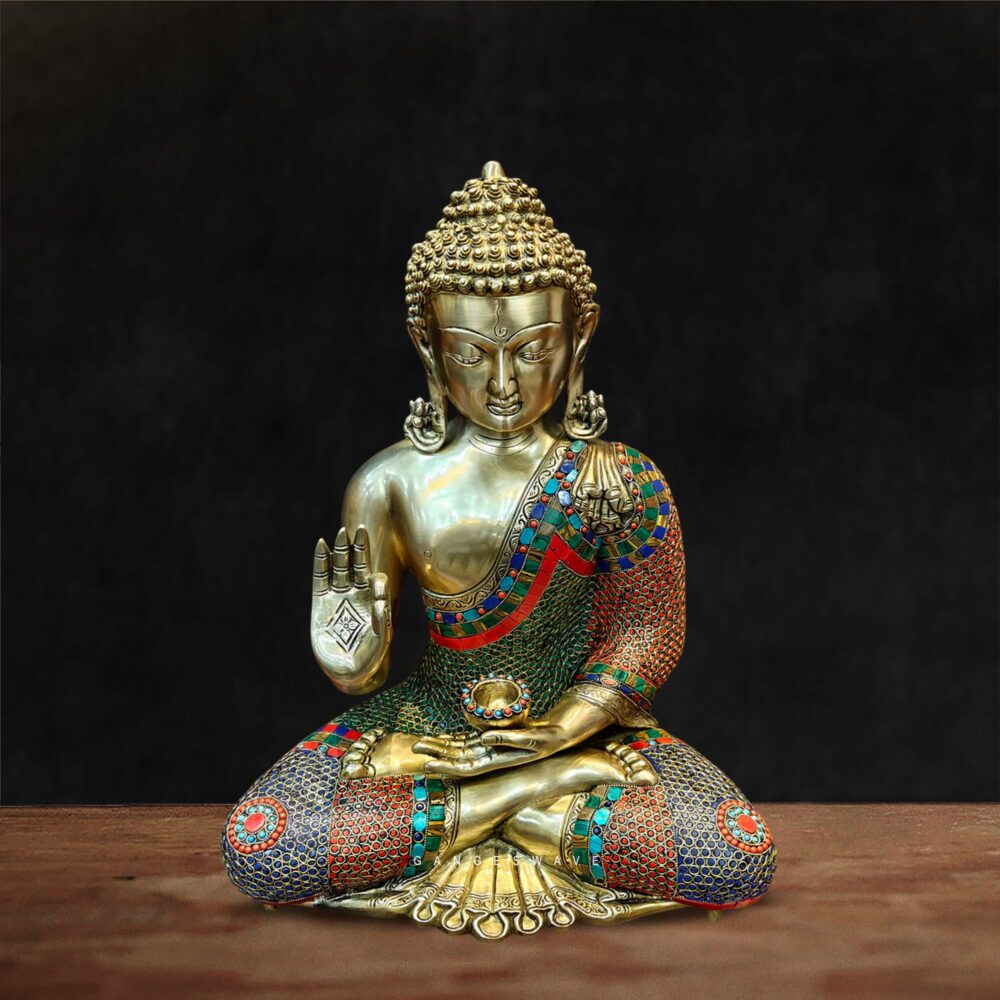 Colorful brass Buddha statue with stone inlay