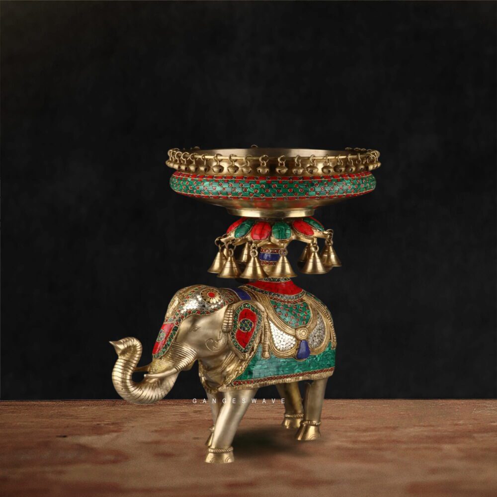 Handcrafted Indian brass elephant artifact with decorative bowl on top