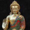Colorful brass Buddha statue with stone inlay