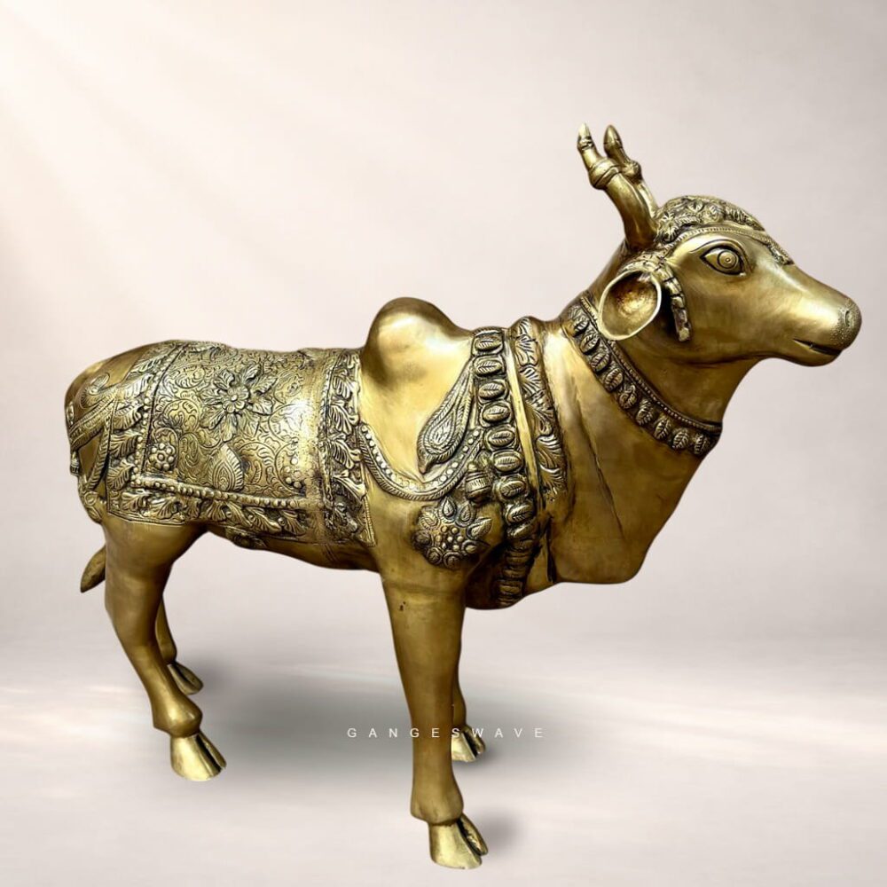 Sacred Kamdhenu brass cow idol with intricate detailing