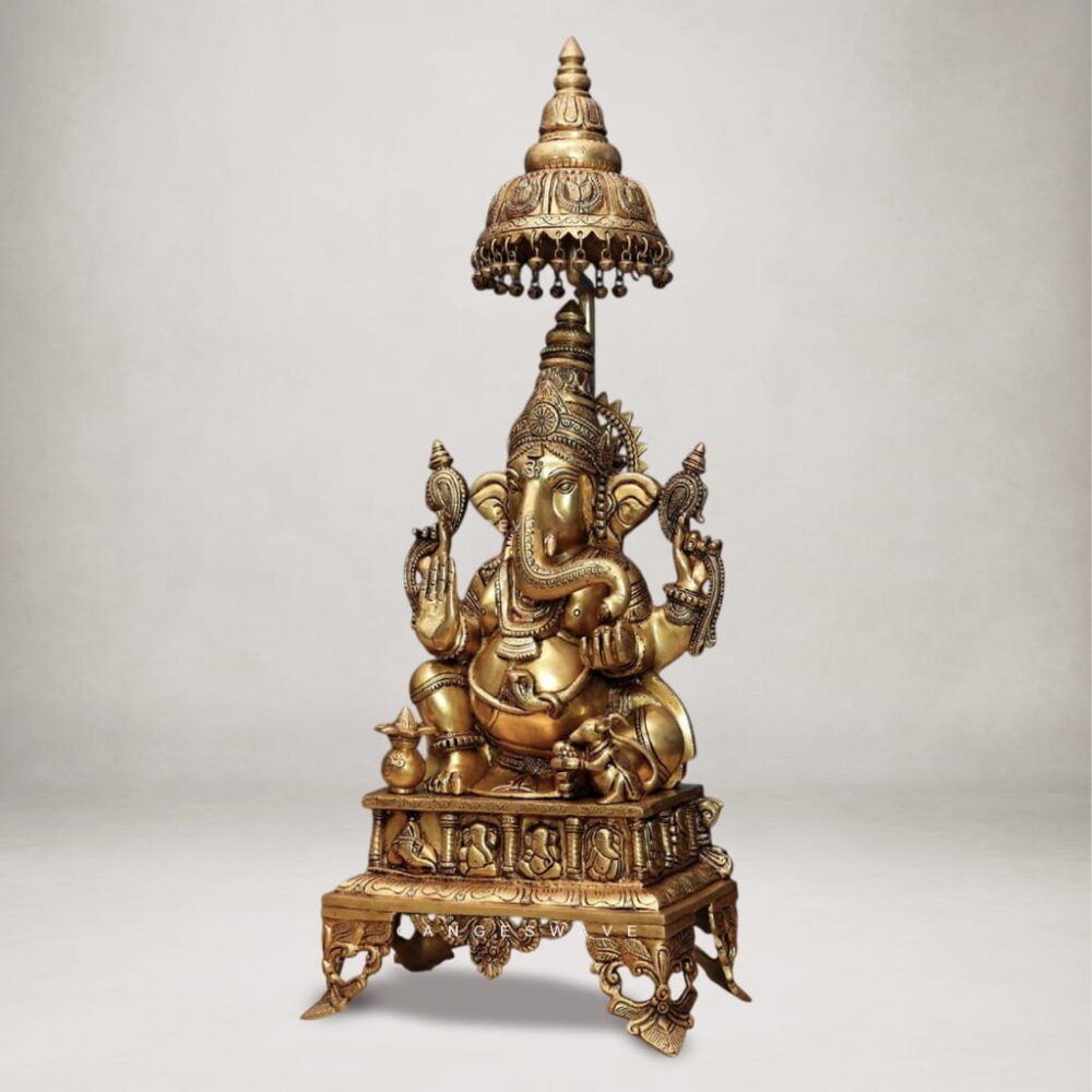 Premium brass Ganesh idol seated under decorative canopy with antique finish