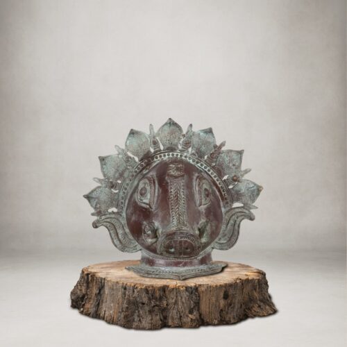 Handcrafted vintage finished brass Varaha mask representing Lord Vishnu’s boar avatar for spiritual wall décor.