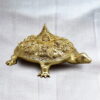 Vastu Shastra brass turtle with Lakshmi figures and temple design