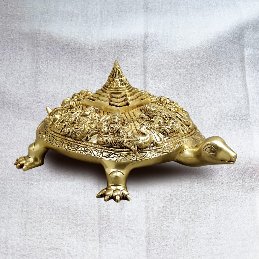Vastu Shastra brass turtle with Lakshmi figures and temple design