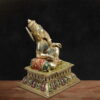Antique finish reclining Lord Ganesha brass murti with jeweled pedestal