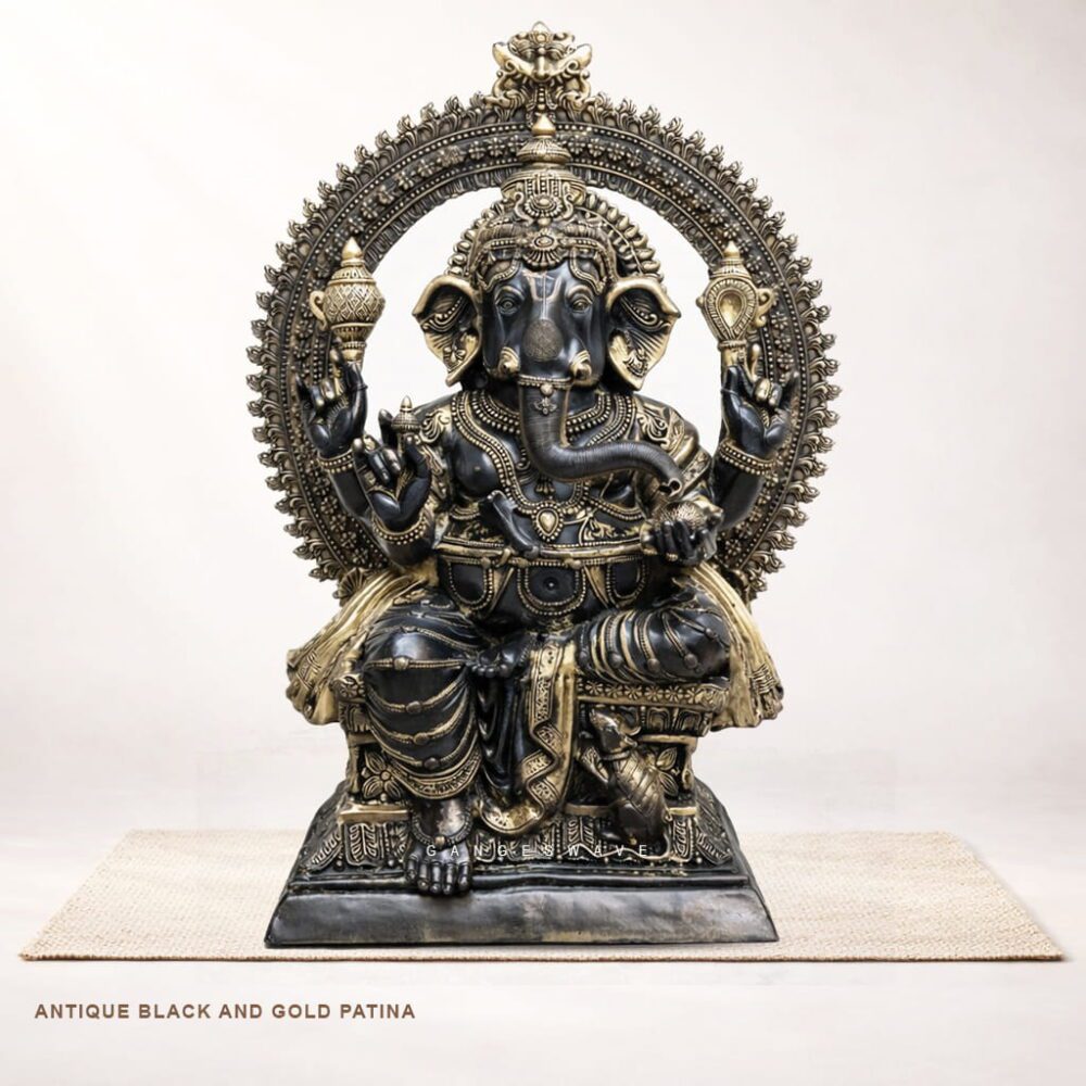 Large handcrafted brass Ganesh statue with antique black and gold patina for home temple decor