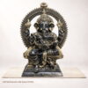 Large handcrafted brass Ganesh statue with antique black and gold patina for home temple decor