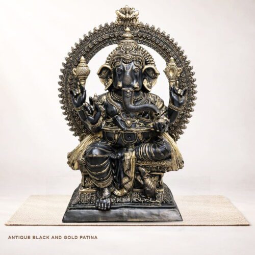 Large handcrafted brass Ganesh statue with antique black and gold patina for home temple decor