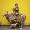 Superfine Meenakari Brass Krishna Sitting on Cow with Calf