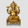 Handcrafted superfine brass Lord Ganesha statue with intricate carvings seated on an ornate throne, luxury Indian brass idol for home temple and premium interior décor.