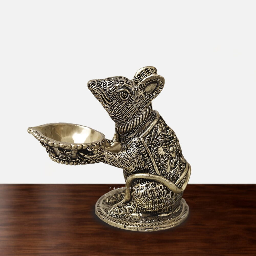 Handcrafted Brass Musak Diya featuring intricately detailed mouse holding traditional oil lamp bowl in antique brass finish