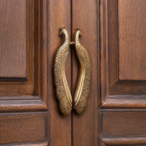 Luxury handcrafted antique brass peacock door handle pair with intricate feather engraving for premium wooden entrance doors