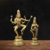 Handcrafted solid brass Nataraja and Parvati statue set featuring Lord Shiva in cosmic dance and Goddess Parvati in graceful posture for home temple, meditation space, and luxury home décor.
