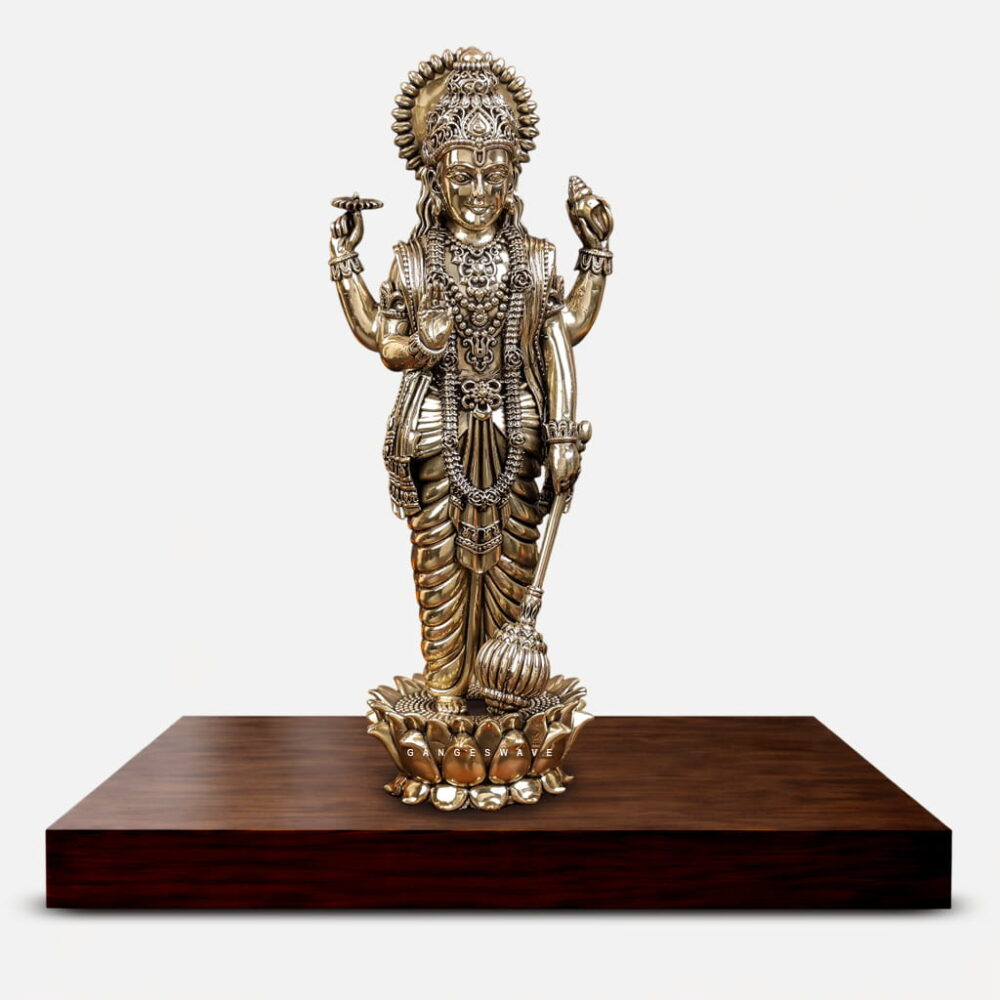 SHandcrafted superfine brass Lord Vishnu statue standing on lotus pedestal with intricate detailing and antique gold finish for home temple décor.
