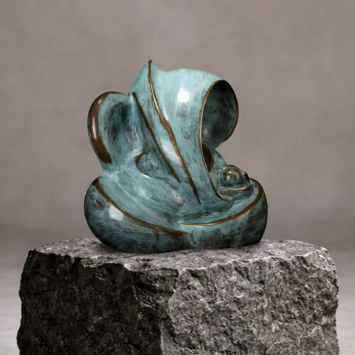 Abstract brass Ganesha sculpture with verdigris patina finished in contemporary minimalist design for luxury home décor.