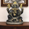 Handcrafted black brass Lord Ganesha idol with silver and gold detailing for luxury home temple décor.
