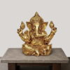 Handcrafted Brass Sitting Ganesha Statue with ornate crown and Abhaya Mudra, crafted from premium solid brass for home temple, office décor, pooja room, and luxury interiors.