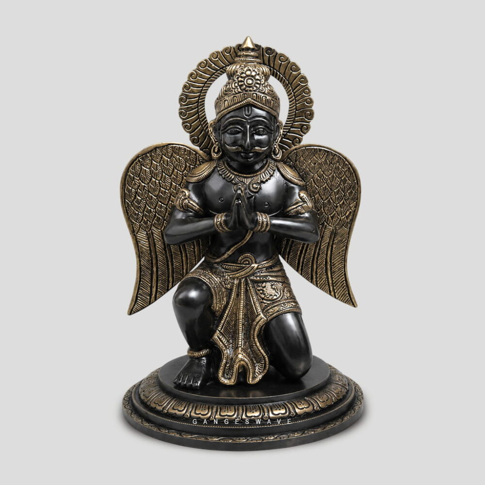 Handcrafted antique finish Brass Garuda idol with folded hands featuring intricate wing detailing, luxury religious décor for home temple and premium interiors.
