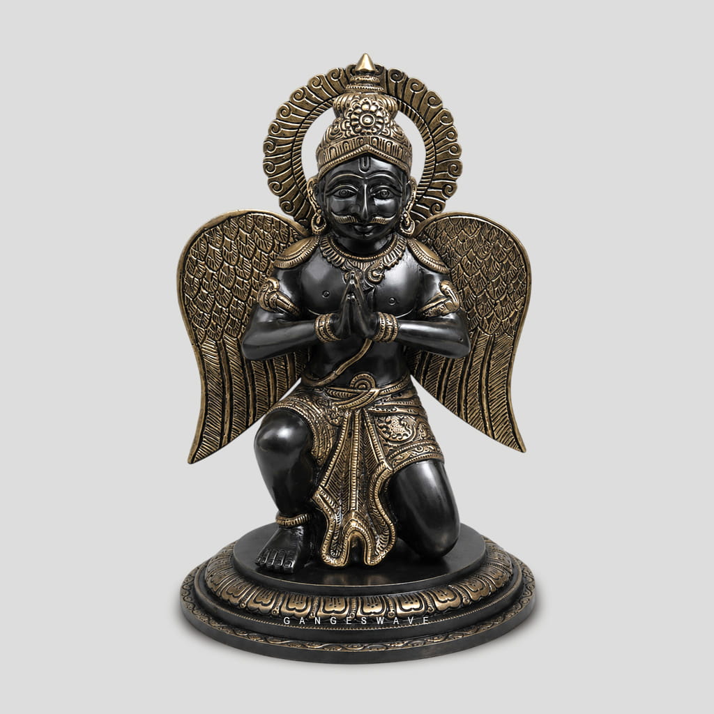 Handcrafted antique finish Brass Garuda idol with folded hands featuring intricate wing detailing, luxury religious décor for home temple and premium interiors.