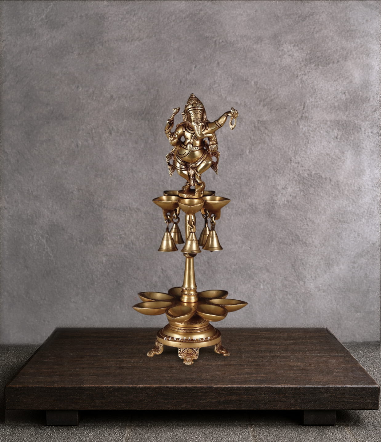 Antique brass dancing Ganesha diya with hanging bells and multi-tier oil lamp bowls, handcrafted Nritya Ganapati statue for Hindu puja and aarti