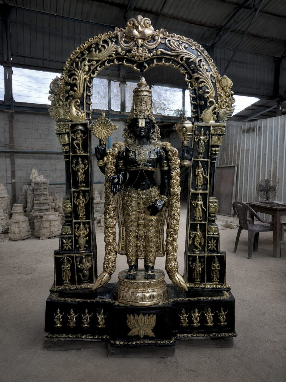 Luxury handcrafted black and antique gold Lord Venkateswara Tirupati Balaji brass statue with ornate South Indian temple prabhavali for premium home and temple décor.