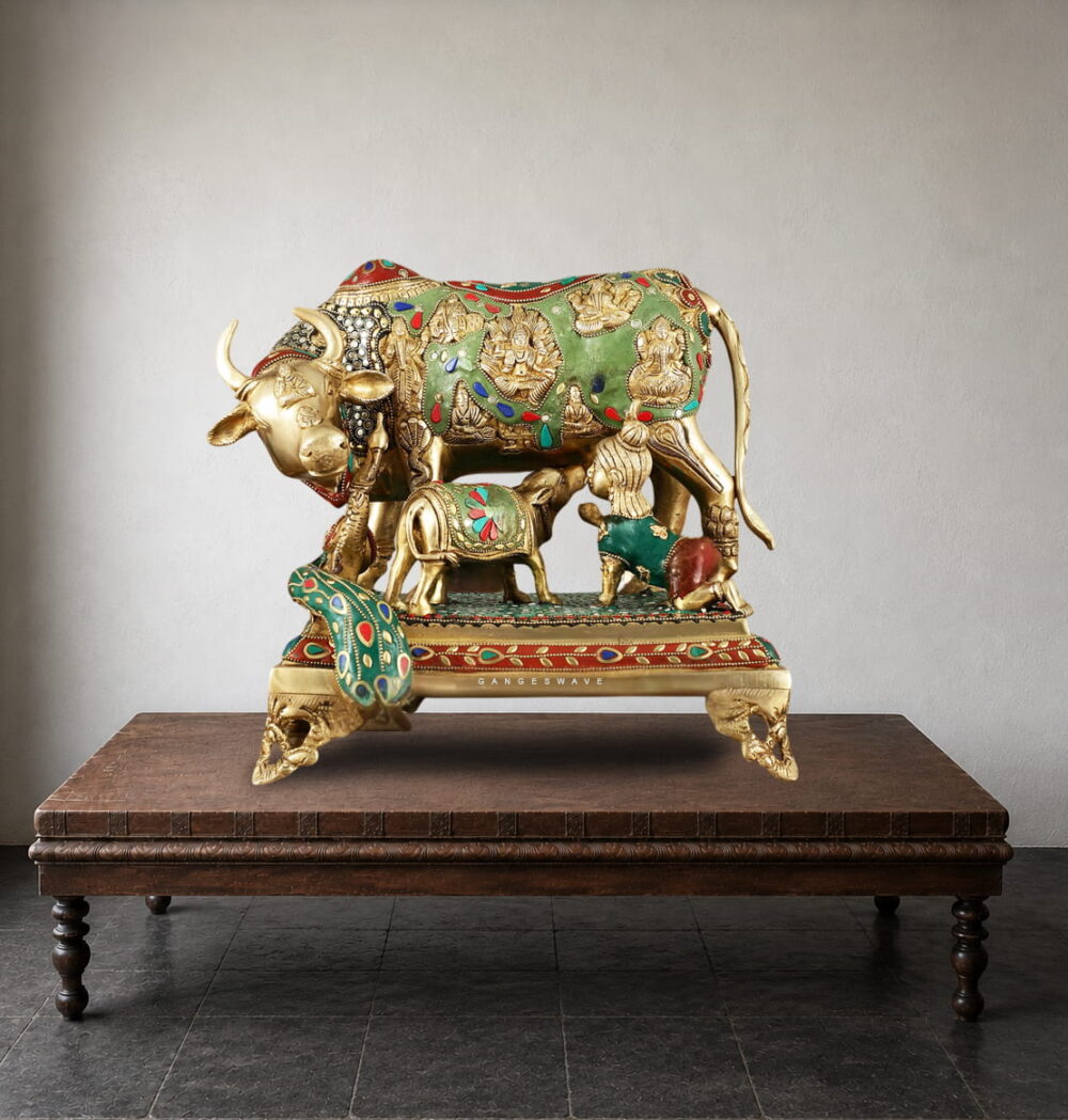 Handcrafted Meenakari Kamdhenu Brass Statue with Calf featuring intricate enamel artwork and divine carvings for luxury home décor and temple decoration.