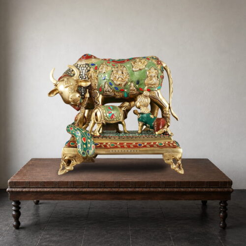 Handcrafted Meenakari Kamdhenu Brass Statue with Calf featuring intricate enamel artwork and divine carvings for luxury home décor and temple decoration.