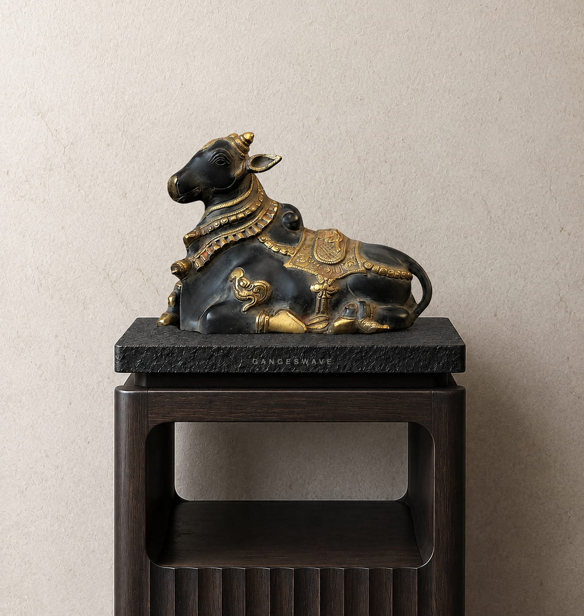 Black and gold brass Nandi statue with intricate antique detailing