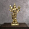 Handmade premium solid brass Lord Murugan statue holding Vel, Trishul and Seval Kodi with peacock, ideal for home temple, puja room and luxury spiritual décor.