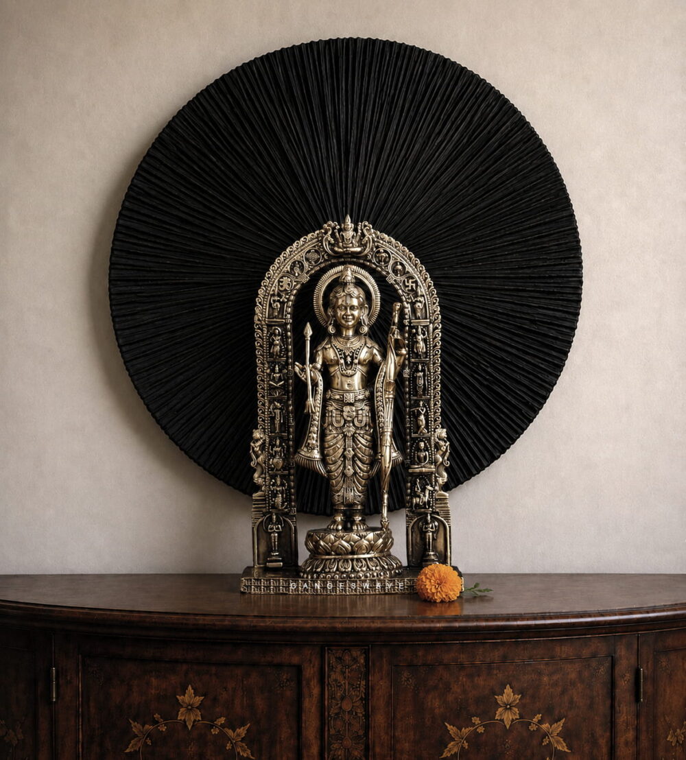 Brass Ram Lalla idol standing with bow and arrow beneath an ornate traditional arch