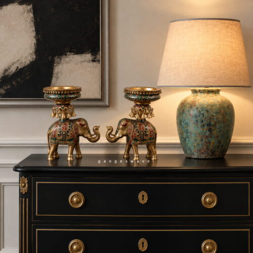 Meenakari brass elephant Urli with ornate detailing and hanging brass bells