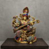 Handcrafted Meenakari brass Goddess Saraswati statue playing Veena with colorful traditional enamel detailing for home temple, study room and luxury décor.