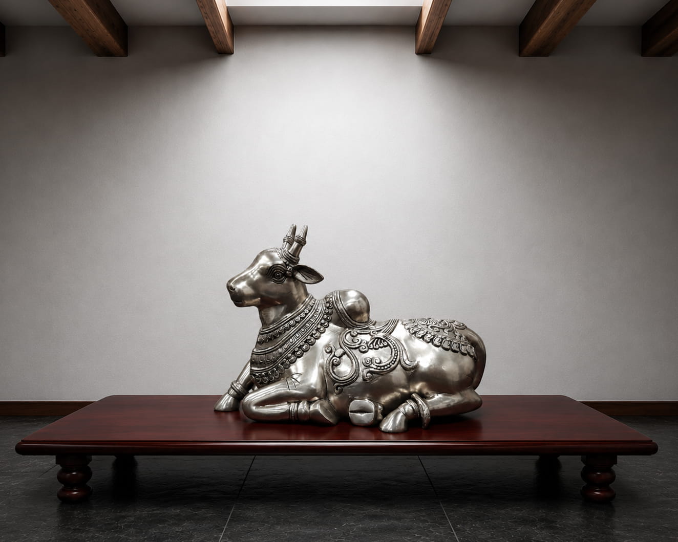 Handcrafted silver finish brass Nandi statue with intricate traditional carvings for Shiva temple, luxury home décor and spiritual interiors.