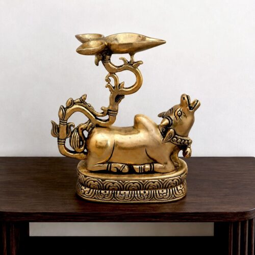 Handcrafted brass Nandi diya with ornate oil lamp