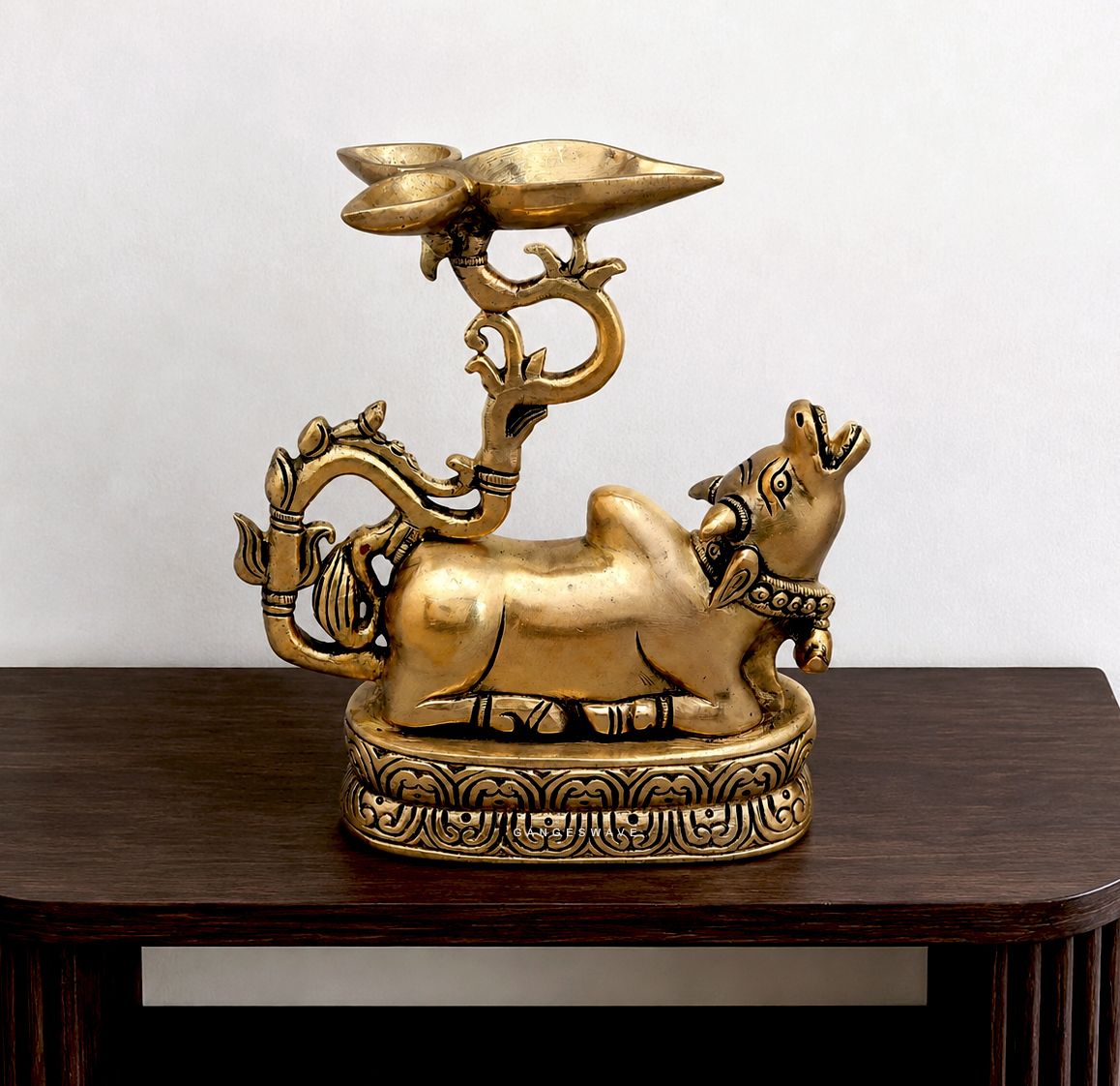 Handcrafted brass Nandi diya with ornate oil lamp