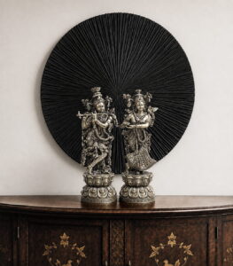 11-inch handcrafted Brass Radha Krishna Idol depicting Krishna playing the flute with Radha on ornate lotus pedestals