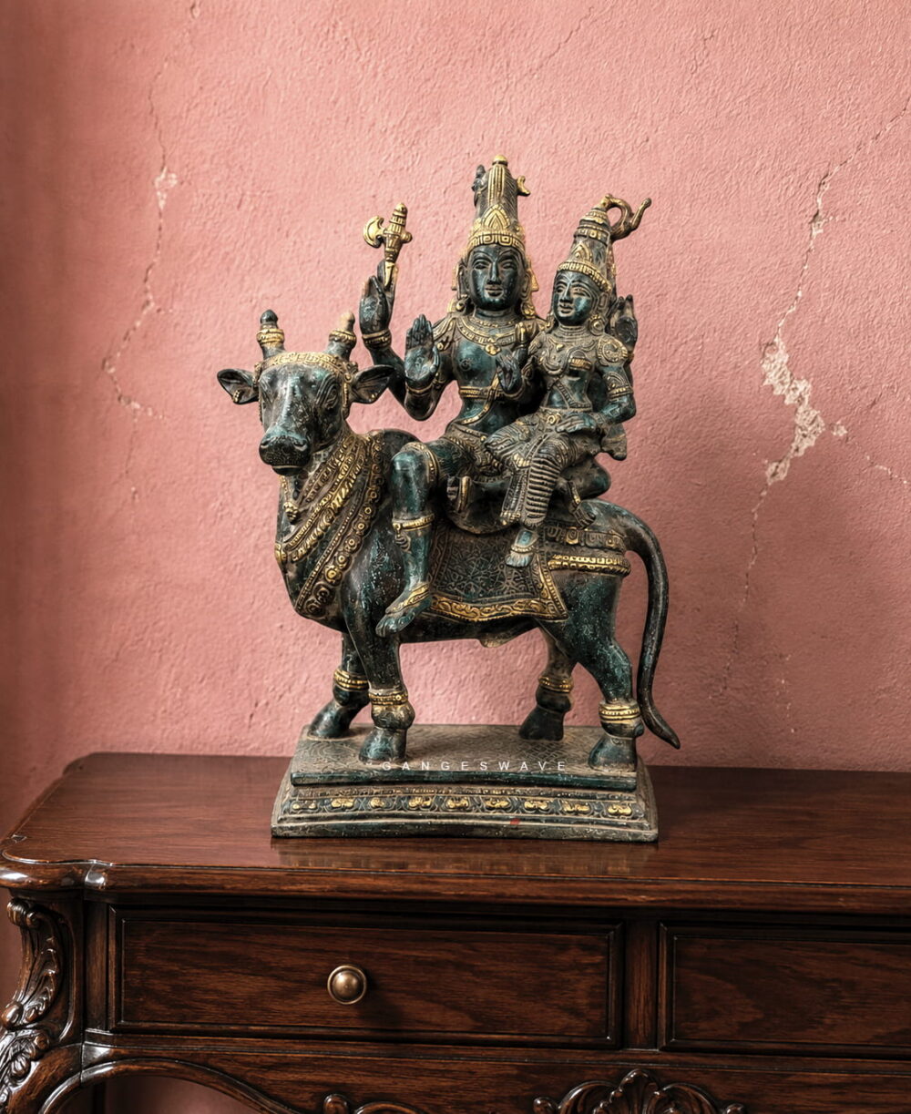Handcrafted vintage finish brass Shiv Parvati seated on Nandi statue for home temple, luxury décor and spiritual interiors.