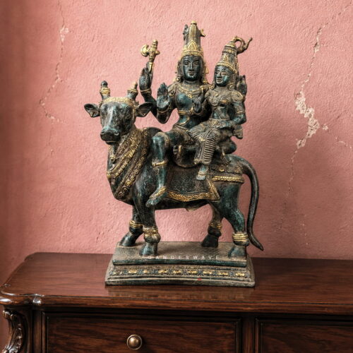 Handcrafted vintage finish brass Shiv Parvati seated on Nandi statue for home temple, luxury décor and spiritual interiors.