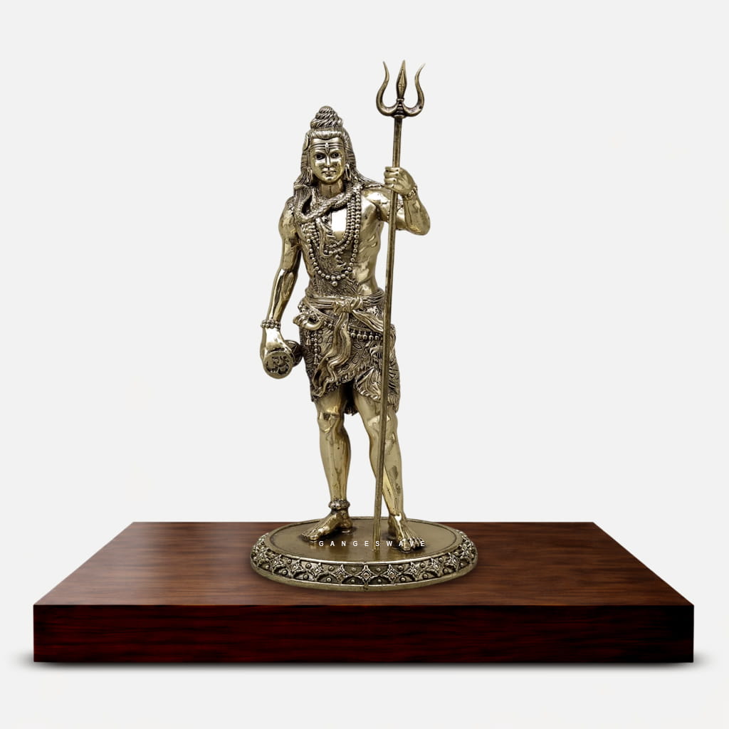 Standing Lord Shiva brass statue with Trishul and damaru, handcrafted Mahadev idol for home temple and spiritual décor