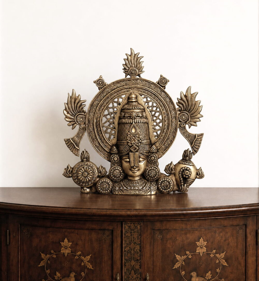 Premium handcrafted Brass Tirupati Balaji Bust featuring Lord Venkateswara with an intricately carved Prabhavali, Shankha, Chakra, and traditional South Indian temple motifs.