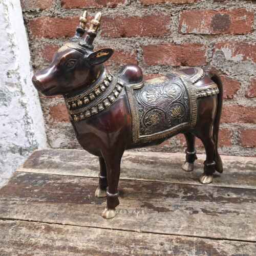 Antique brass Nandi statue with intricate traditional detailing